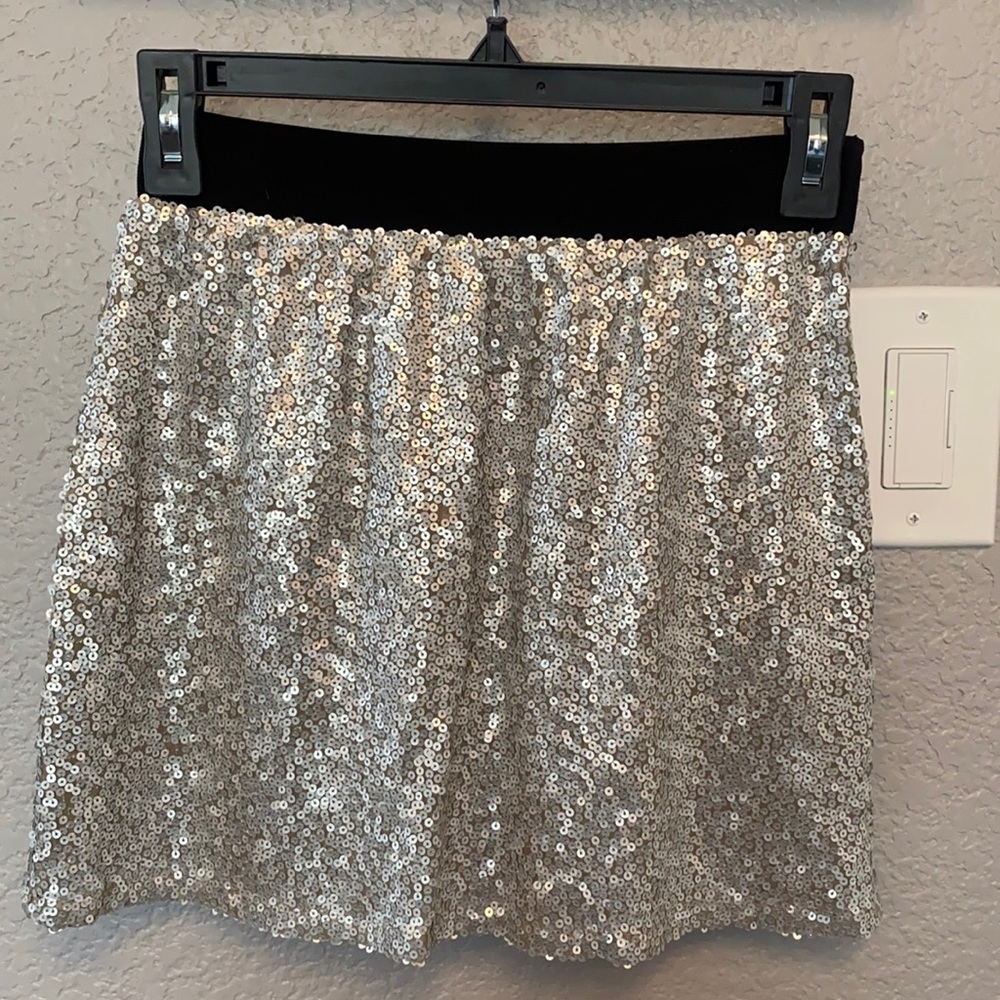 Silver sequin mini skirt. Great for date night, girls night out or parties.